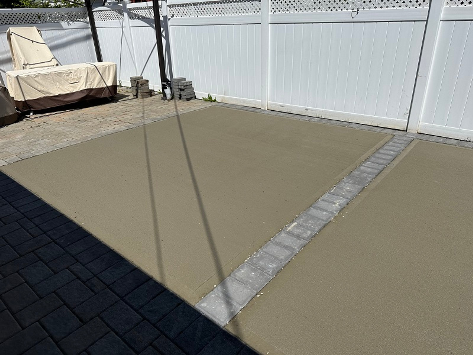 Freshly troweled concrete slab, cured and released